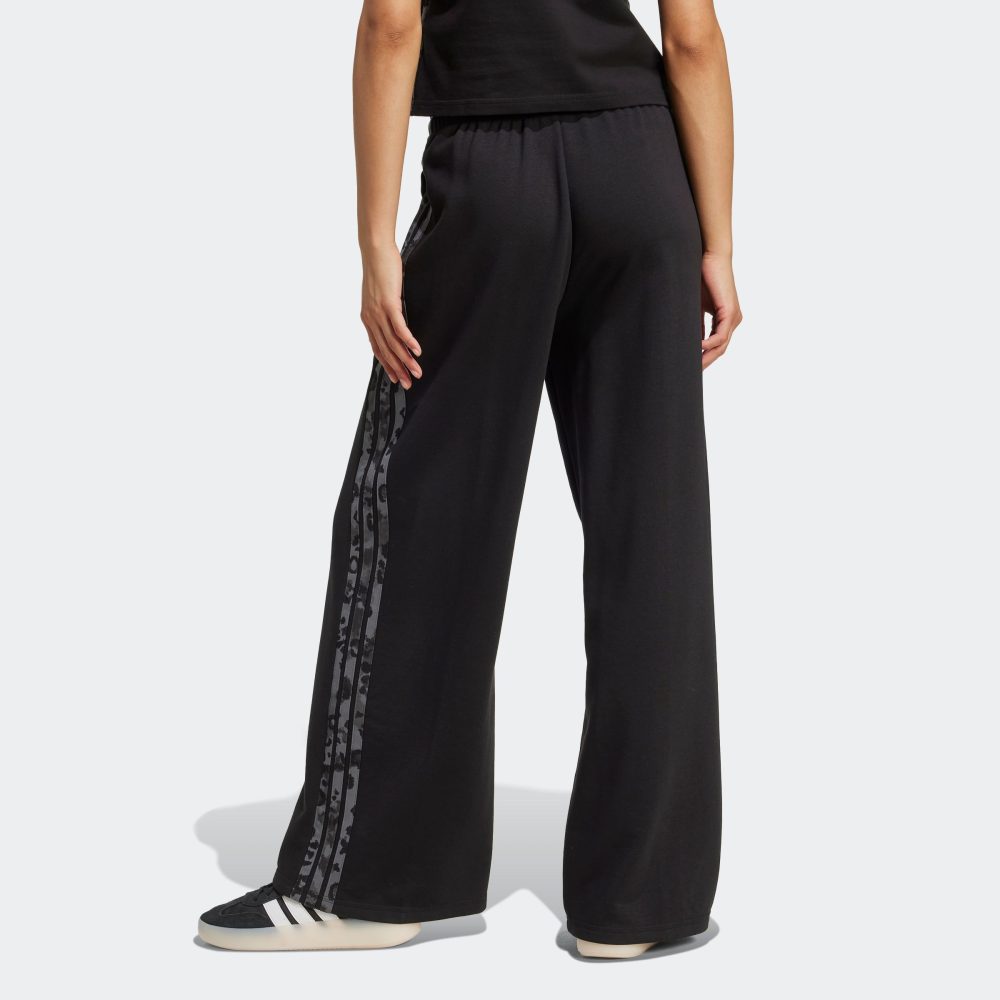 adidas Sportswear Sporthose »W AOP FT PT«, (1 tlg.), Locker geschnitten mit weitem Bein, Tierprint-Details